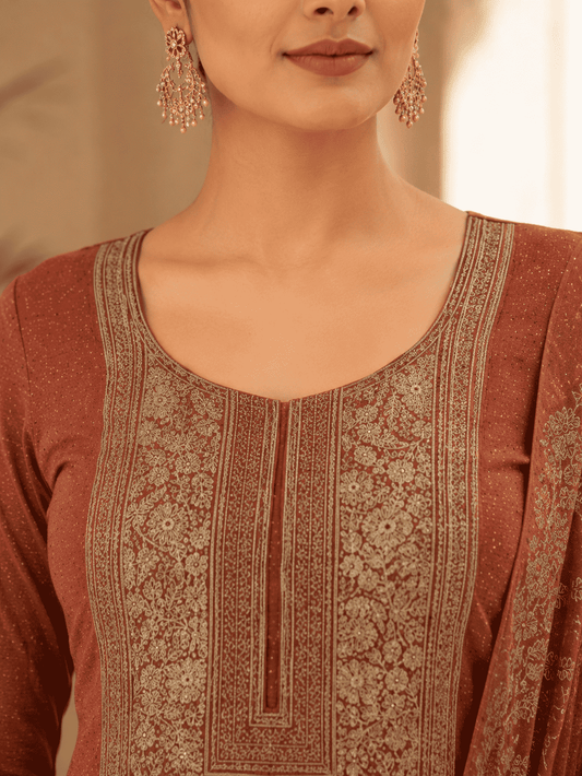 Semi-Stitched Deep Wine-Red Muslin Silk Suit Embellished With Scattered Rhinestone Butti And Intricate Golden Zari Embroidery