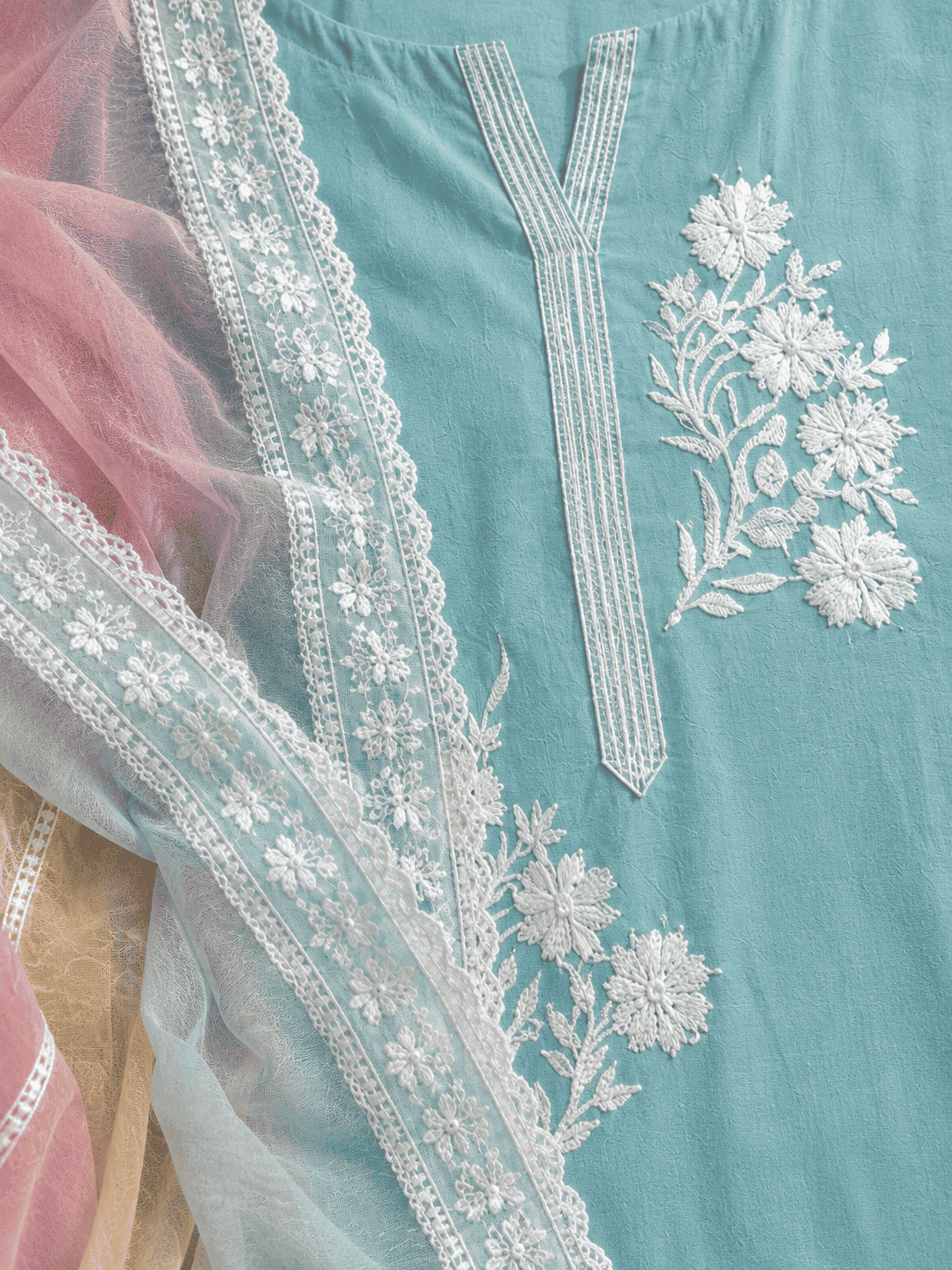 Unstitched sea green embroidered cotton suit set with a contrasting dupatta