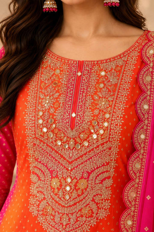 Orange Chinon Bandhani Kurta Set With Intricate Embroidery Paired With Fuchsia Pink Dupatta