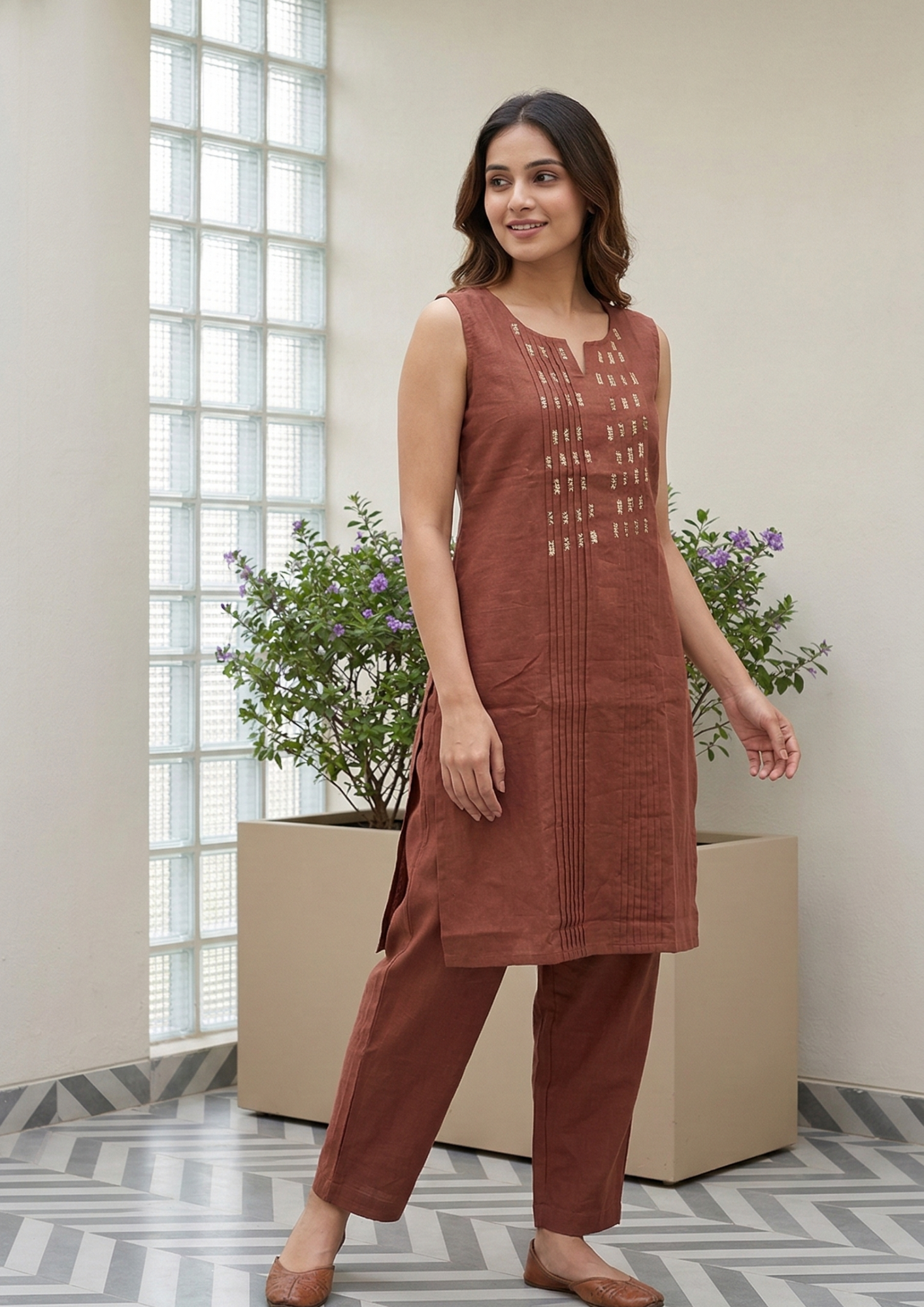 Rust orange cotton kurta pant set with subtle thread embroidery