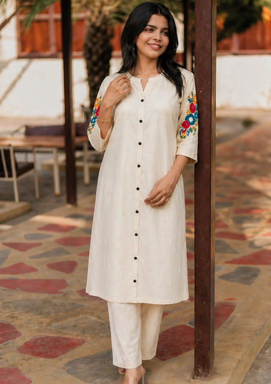 Off white kurta with blue embroidery and pant set