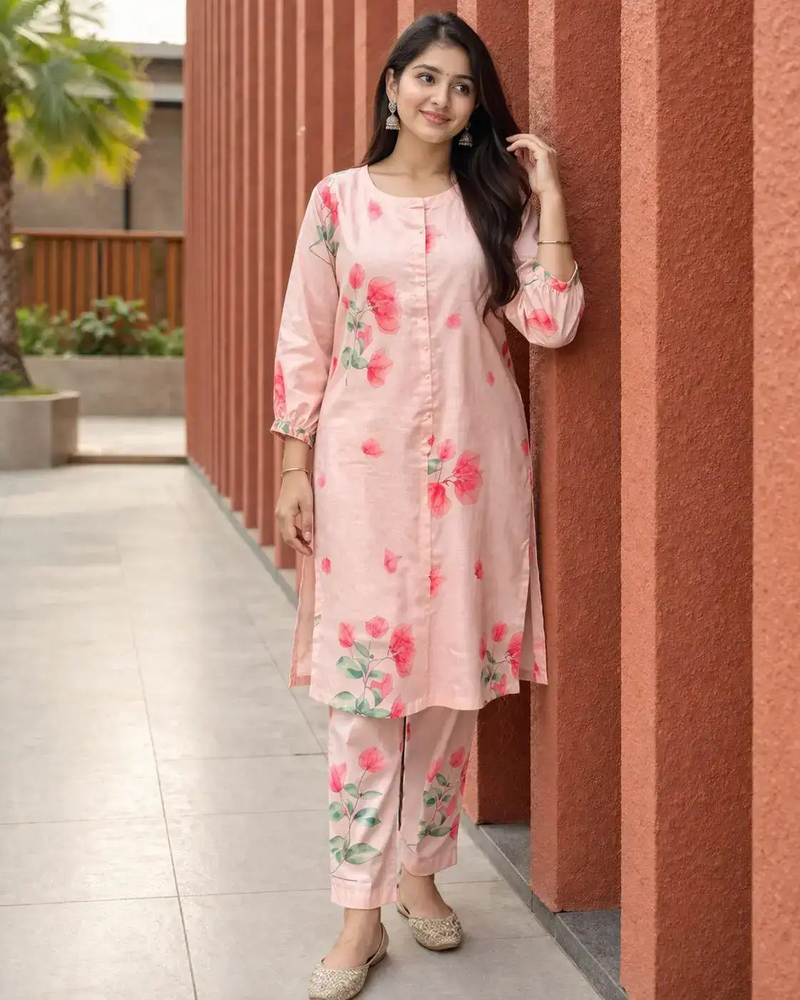 Soft cotton blend fabric in blush peach with delicate floral prints
