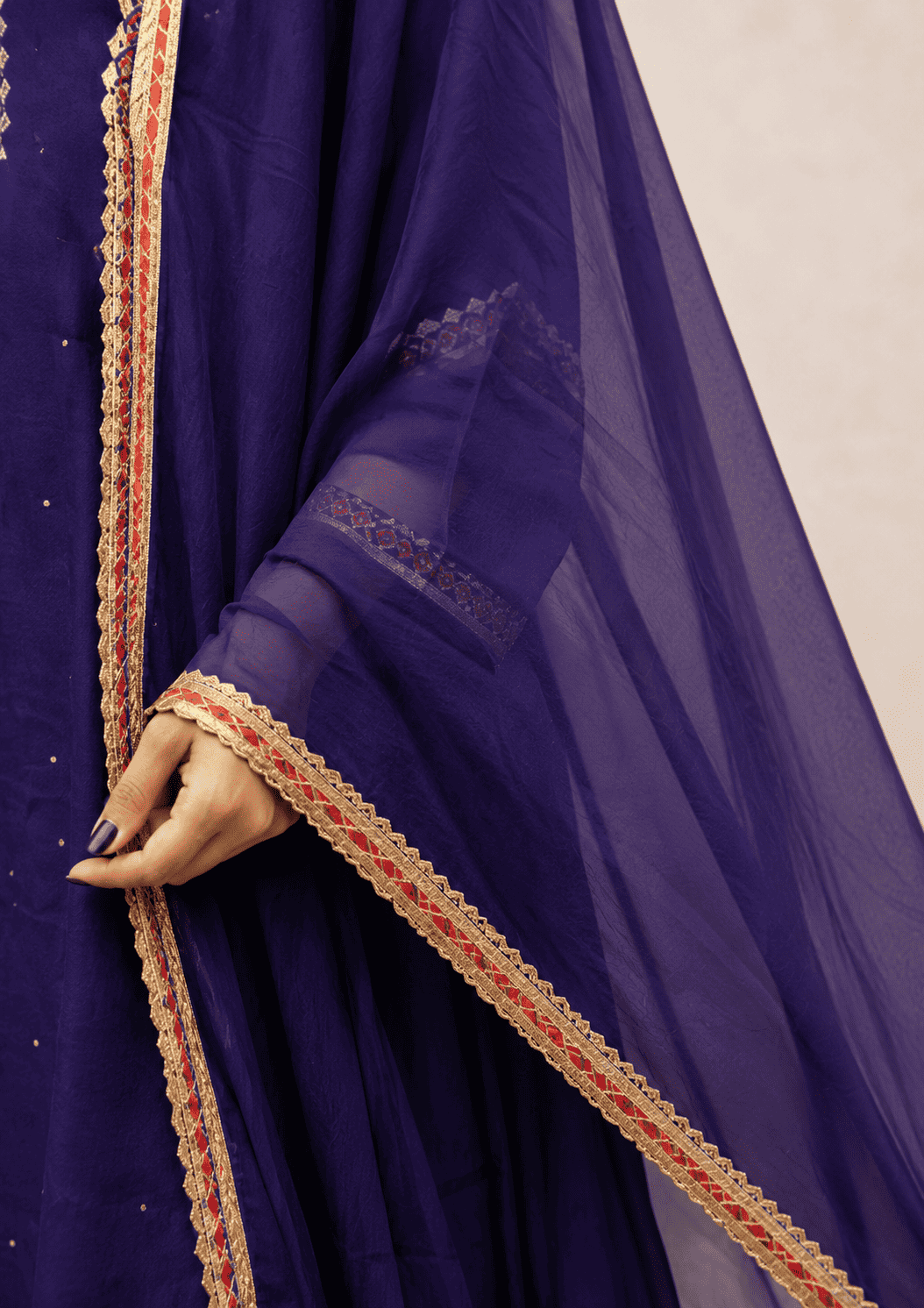 Royal blue silk kurta sharara set with embroidered detailing and chiffon dupatta
