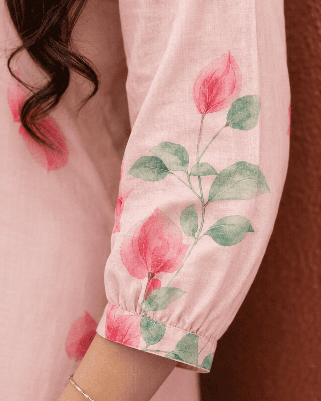 Soft cotton blend fabric in blush peach with delicate floral prints