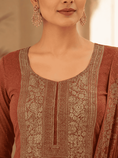 Semi-Stitched Deep Wine-Red Muslin Silk Suit Embellished With Scattered Rhinestone Butti And Intricate Golden Zari Embroidery
