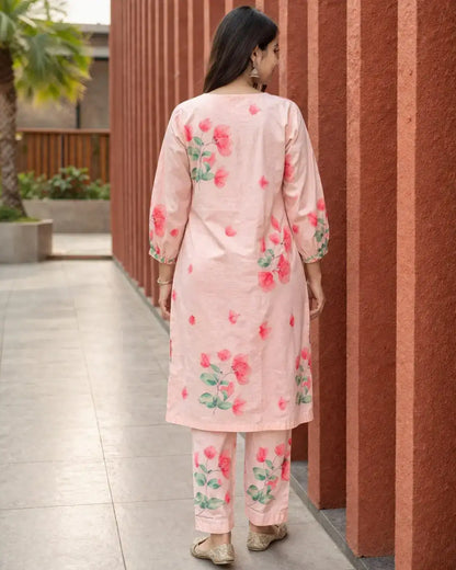 Soft cotton blend fabric in blush peach with delicate floral prints