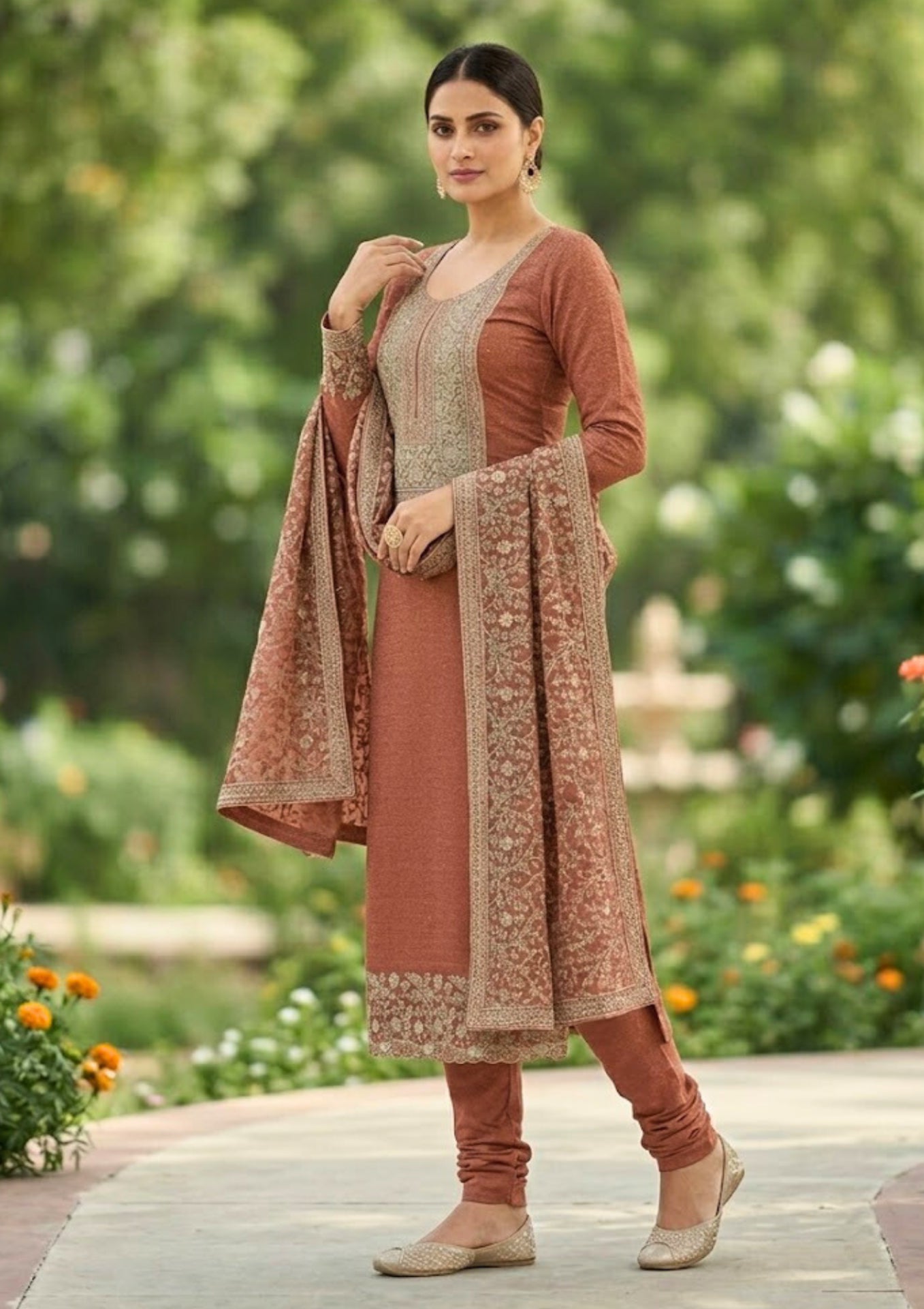 Semi-Stitched Deep Wine-Red Muslin Silk Suit Embellished With Scattered Rhinestone Butti And Intricate Golden Zari Embroidery