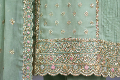 Semi-Stitched Soft Organza In Pastel Aqua With Intricate Multicolour Thread And Sequin Embroidery Suit Material