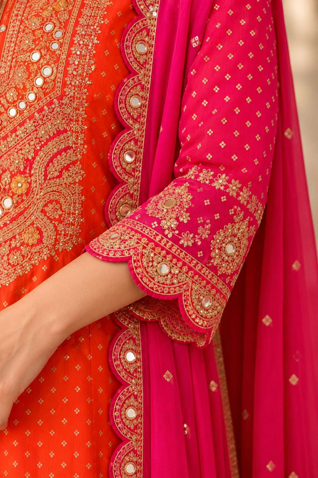Orange Chinon Bandhani Kurta Set With Intricate Embroidery Paired With Fuchsia Pink Dupatta