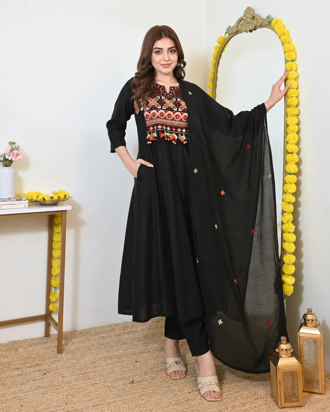 Black kurta with red and orange embroidery and pant set