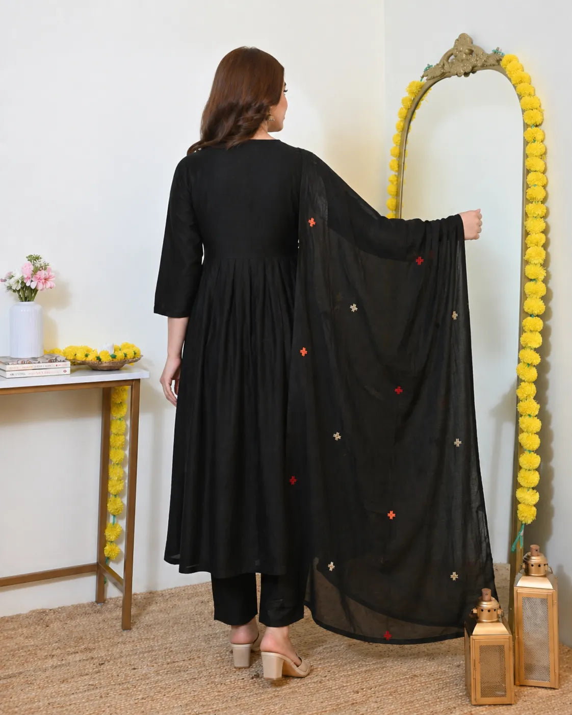 Black kurta with red and orange embroidery and pant set
