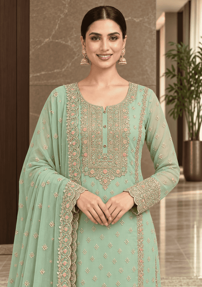Semi-Stitched Soft Organza In Pastel Aqua With Intricate Multicolour Thread And Sequin Embroidery Suit Material