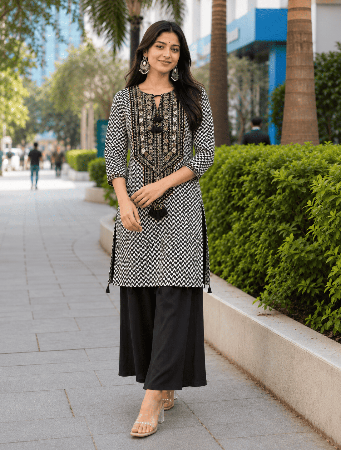 Black Muslin Subtle Embroidered and Printed Kurta Pant Set