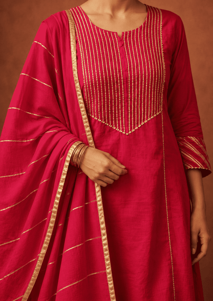 Fuchsia gota work cotton kurta pant set with gold stripes dupatta