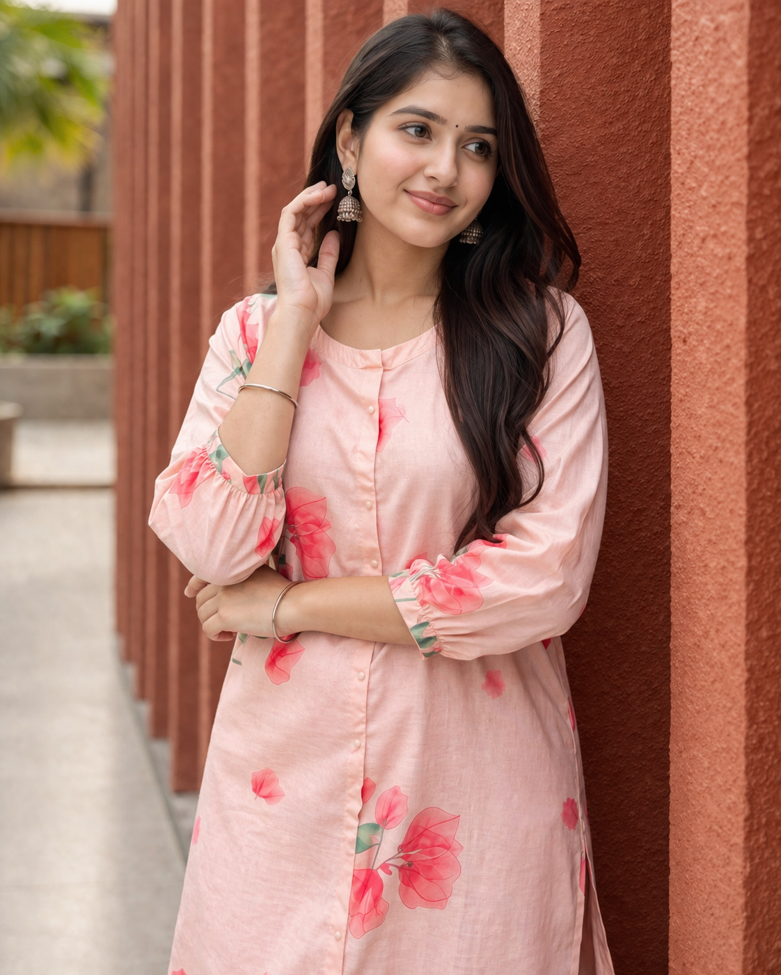 Soft cotton blend fabric in blush peach with delicate floral prints