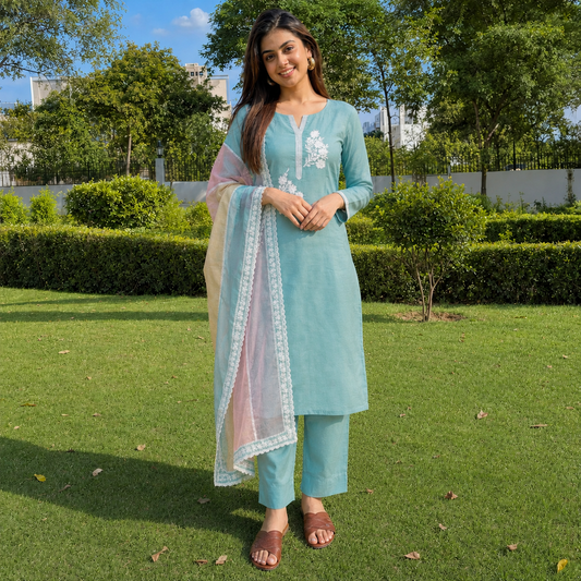 Unstitched sea green embroidered cotton suit set with a contrasting dupatta