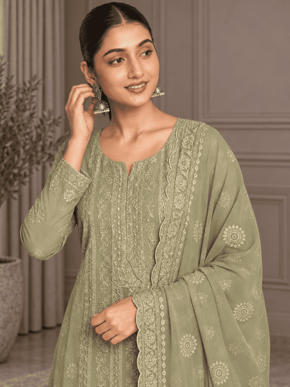 Unstitched Pastel Pistachio Green Chiffon Suit With Intricate Ivory Threadwork And Subtle Sequin Sparkle