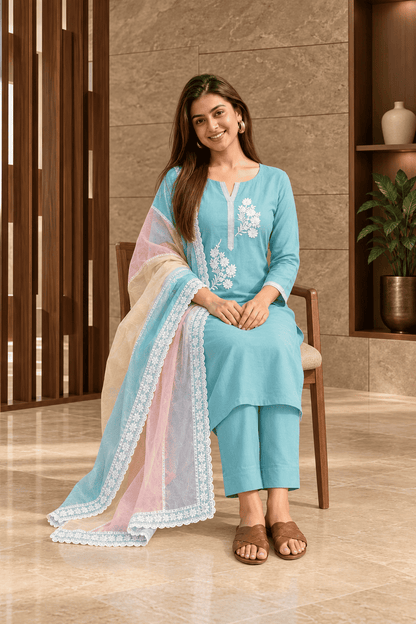 Unstitched sea green embroidered cotton suit set with a contrasting dupatta