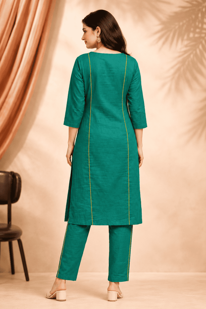 Emerald green vibrant multicolour panel design linen kurta pant set