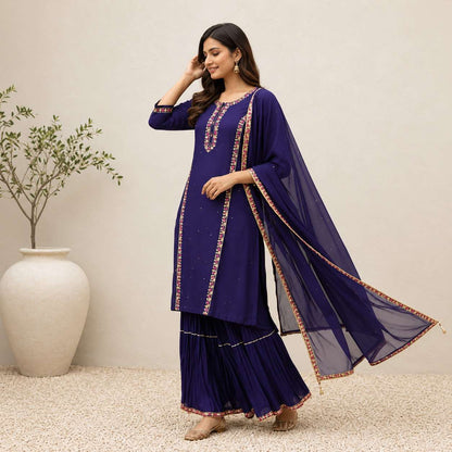 Royal blue silk kurta sharara set with embroidered detailing and chiffon dupatta