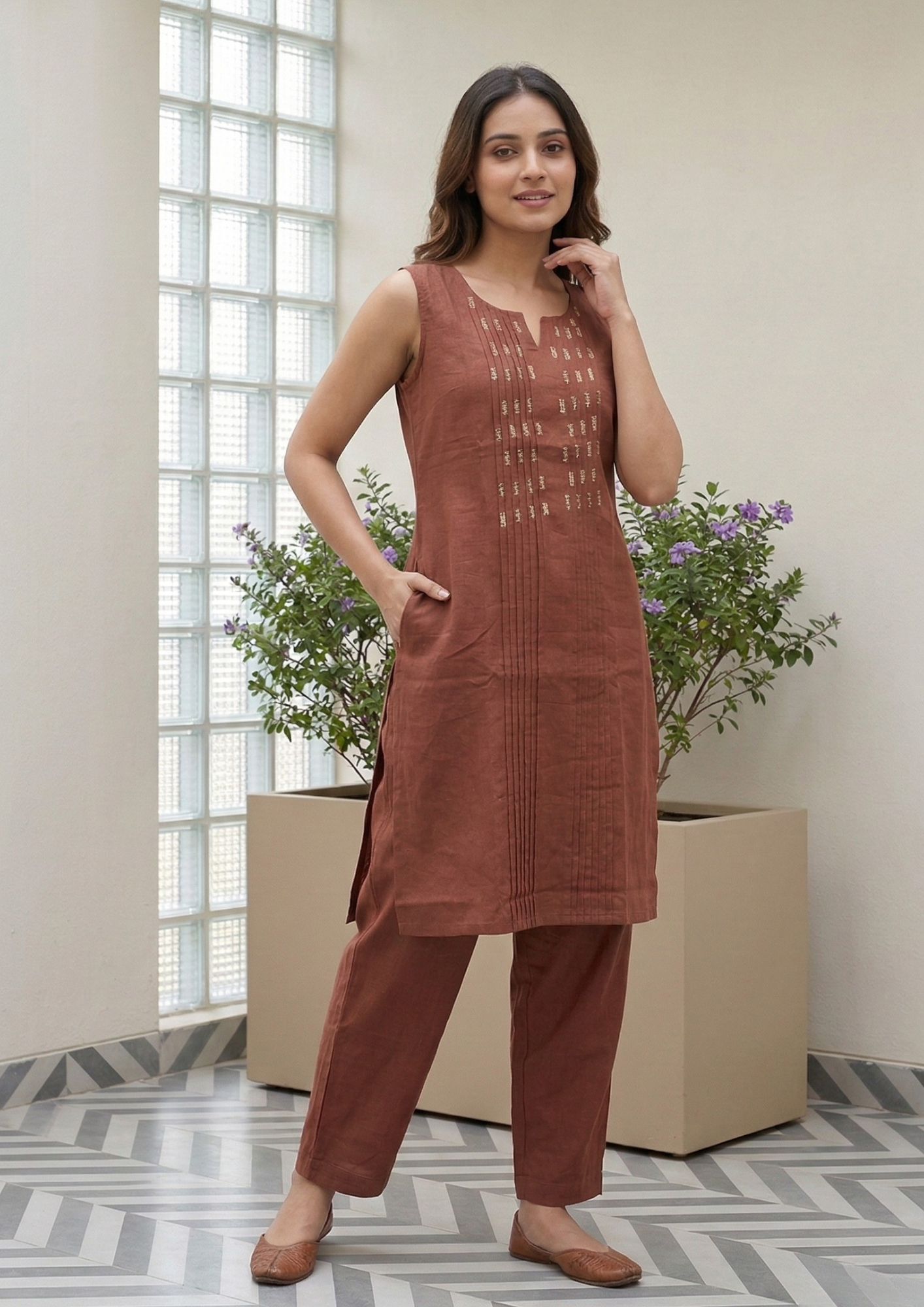 Rust orange cotton kurta pant set with subtle thread embroidery